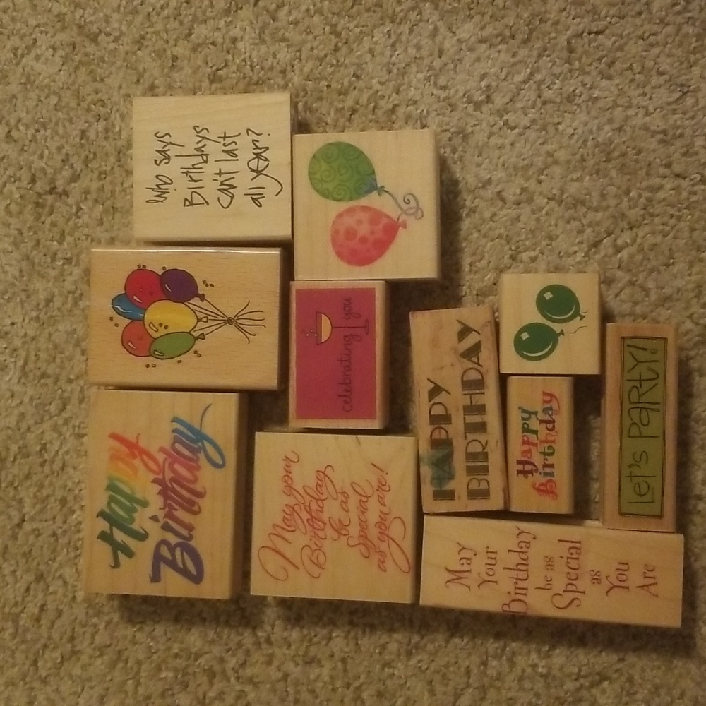 Birthday themed wooden stamps.